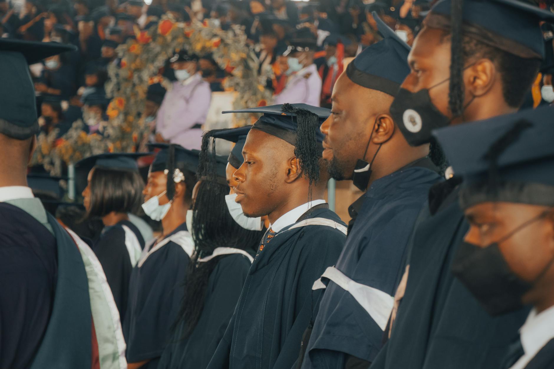 Graduates in Nigeria celebrate their academic achievements in academic regalia — TransferCredit.org