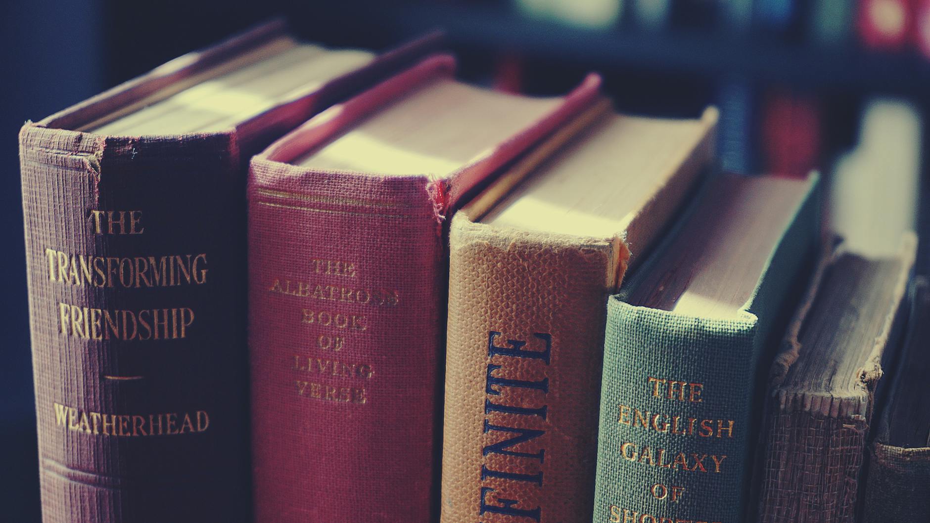 Aesthetic collection of vintage books showcasing classic literature with textured covers — TransferCredit.org